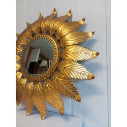 Miroir soleil métal doré